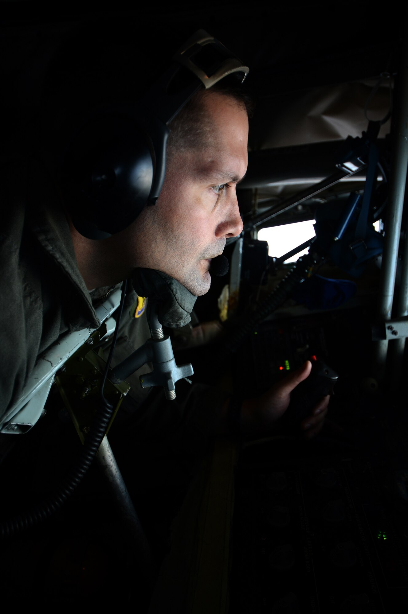 U.S. Air Force Senior Master Sgt. Doug Palmisano, KC-135 Stratotanker boom operator assigned to the 909th Air Refueling Squadron, Kadena Air Base, Japan, conducts refueling operations May 12, 2016, over the Joint Pacific Alaska Range Complex. Boom operators on a KC-135 have the ability to pump thousands of pounds of fuel to any capable aircraft, thousands of feet above the ground, flying at 200 knots (230 miles per hour), all while only 47 feet from the receiving aircraft. (U.S. Air Force photo by Tech. Sgt. Steven R. Doty)