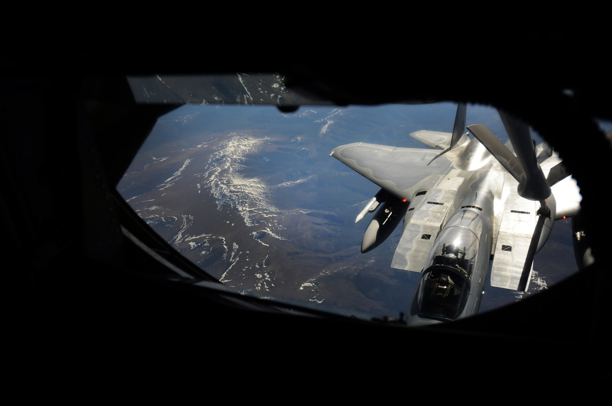 An F-15C Eagle aircraft with the 67th Fighter Squadron, Kadena Air Base, Japan, receives fuel from a KC-135 Stratotanker from the 909th Air Refueling Squadron, Kadena Air Base, Japan, May 12, 2016, inside the Joint Pacific Alaska Range Complex. The KC-135 provides the core aerial refueling capability for the United States Air Force and has excelled in this role for more than 50 years working to accomplish its primary mission of global reach. (U.S. Air Force photo by Tech. Sgt. Steven R. Doty)