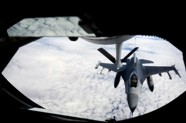An F-16 Fighting Falcon aircraft with the 80th Fighter Squadron, Kunsan Air Base, Republic of Korea, lines up to receive fuel from a KC-135 Stratotanker from the 909th Air Refueling Squadron, Kadena Air Base, Japan, to begin an inflight refueling procedure May 12, 2016, inside the Joint Pacific Alaska Range Complex. In September of 1981, the 80th became the first unit stationed overseas to convert to the F-16 Fighting Falcon and on Jan. 31, 1992, the 80th Tactical Fighter Squadron was redesignated 80 FS. The 80th FS continues to support the United States Contingent in Korea with the same pride and excellence instilled in the squadron from the pilots of the past. (U.S. Air Force photo by Tech. Sgt. Steven R. Doty)