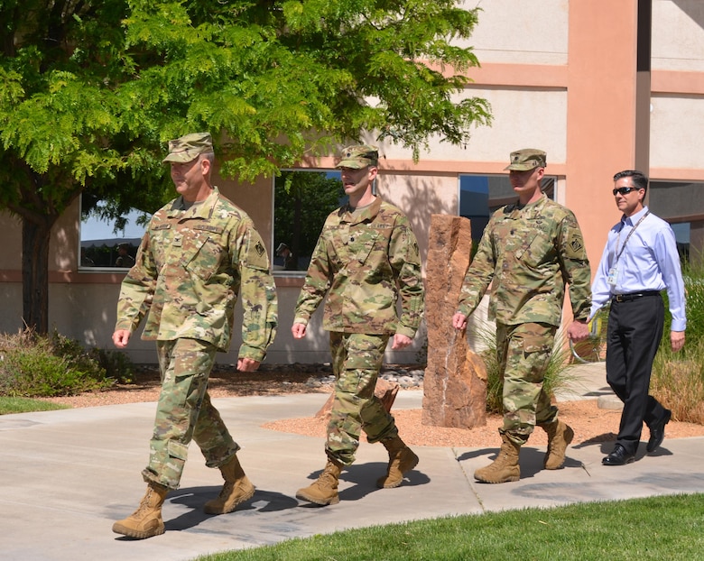 ALBUQUERQUE, N.M. – USACE South Pacific Division Deputy Commander Col. Eric McFadden leads Outgoing Albuquerque District Commander Lt. Col. Patrick Dagon, Incoming District Commander Lt. Col. James Booth, and acting Deputy District Engineer Mike Goodrich in the District’s formal change of command ceremony, May 12, 2016.  