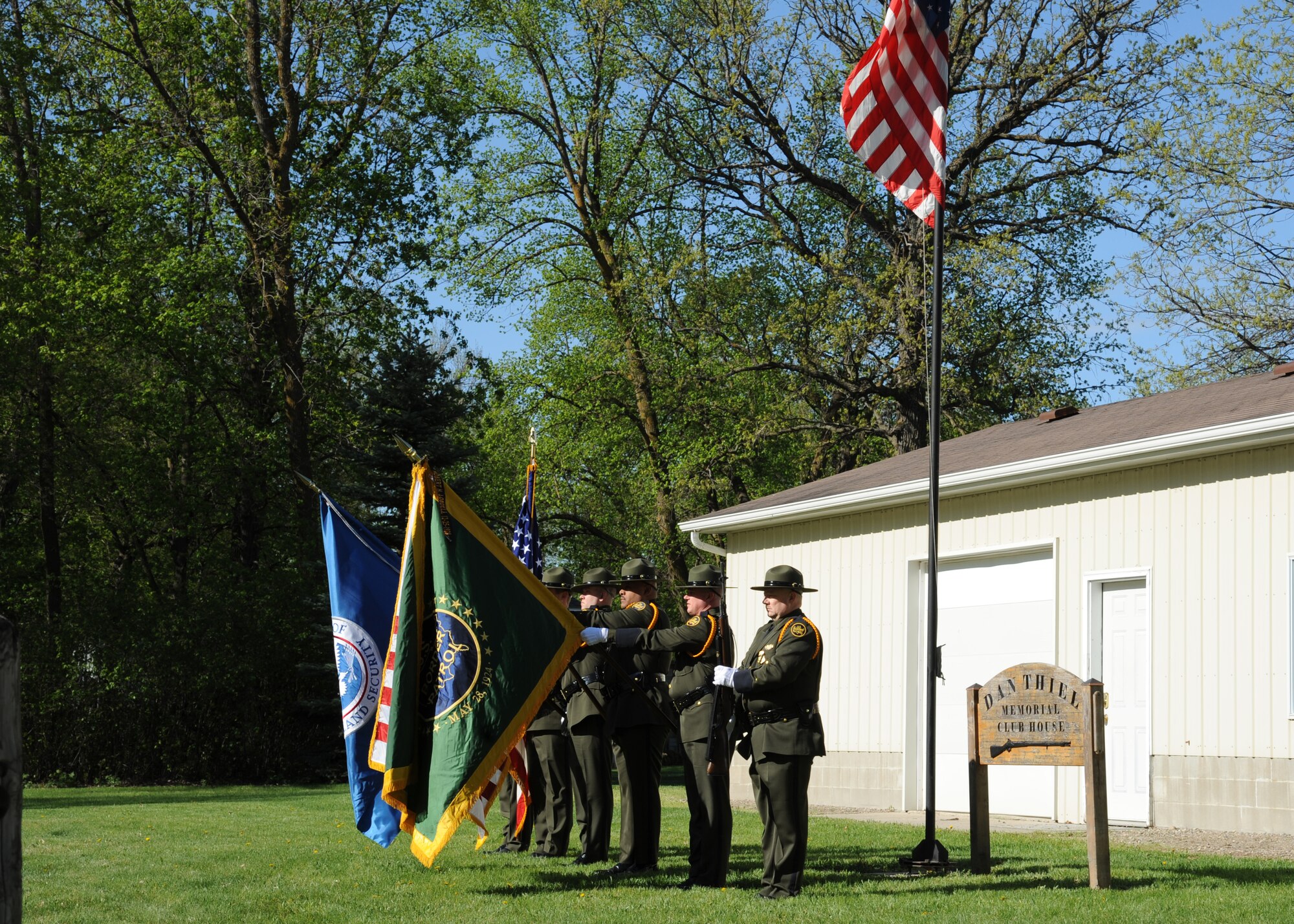 The U.S. Border Patrol Grand Forks Sector Honor Guard presents the colors May 15, 2016, in East Grand Forks, Minn. Law enforcement officers from the surrounding area joined together for a shooting competition and day of camaraderie in honor of National Police Week. (U.S. Air Force photo by Airman 1st Class Ryan Sparks/Released)