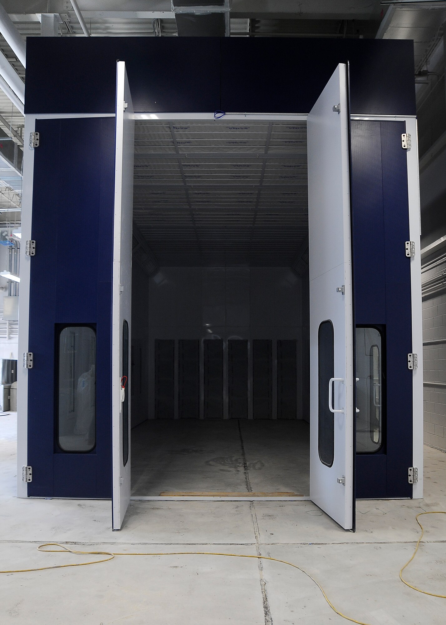 A paint booth that is under construction sits in a hangar at MacDill Air Force Base, Fla., May 12, 2016. A customized paint rack is scheduled to be fabricated and installed into the new paint booth during the next few months at MacDill Air Force Base, Fla. (U.S. Air Force photo by Airman 1st Class Mariette Adams)