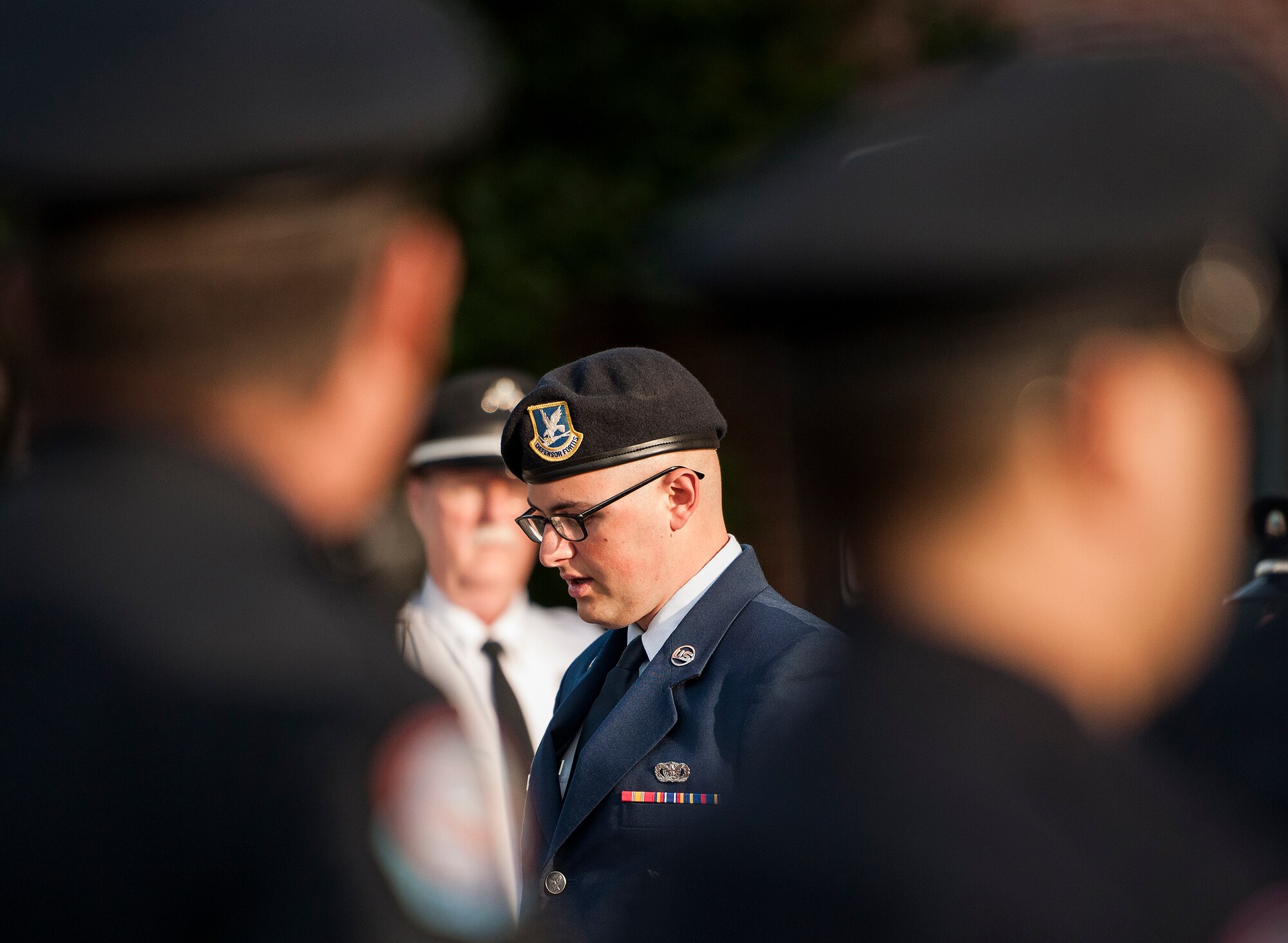 A Security Forces Airman reads off names of fallen peace officers during a memorial ceremony May 16 in Fort Walton Beach, Fla.  The Peace Officers’ Memorial Ceremony was to honor fallen police officers from the previous year by reading their names aloud.  Security forces Airmen from Eglin and Hurlburt Field attended and participated in the event.  The ceremony is one of many events taking place during National Police Week.  (U.S. Air Force photo/Samuel King Jr.)