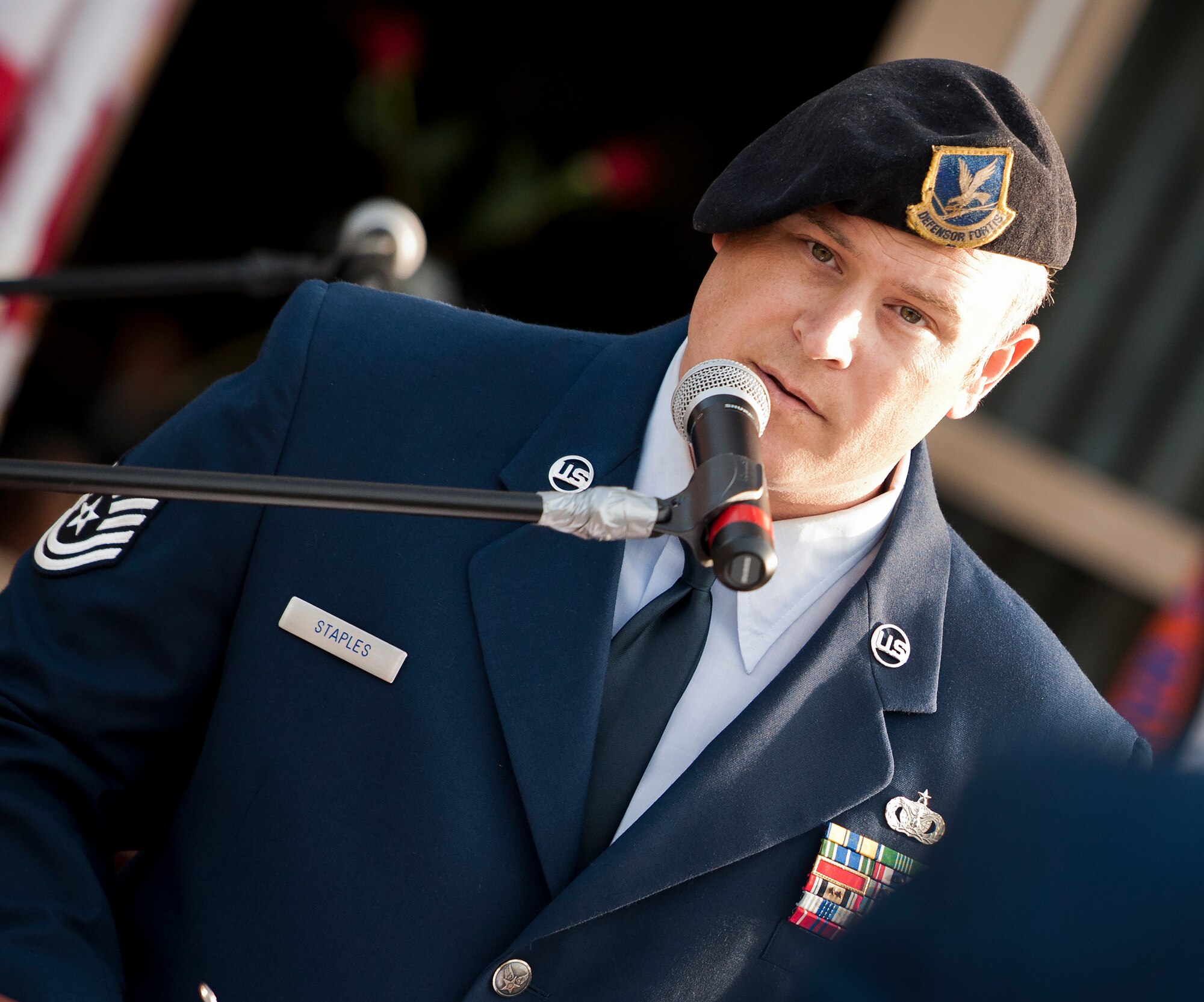 Tech. Sgt. Ryan Staples, 96th Security Forces Squadron, reads off names of fallen peace officers during a memorial ceremony May 16 in Fort Walton Beach, Fla.  The Peace Officers’ Memorial Ceremony was to honor fallen police officers from the previous year by reading their names aloud.  Security forces Airmen from Eglin and Hurlburt Field attended and participated in the event.  The ceremony is one of many events taking place during National Police Week.  (U.S. Air Force photo/Samuel King Jr.)