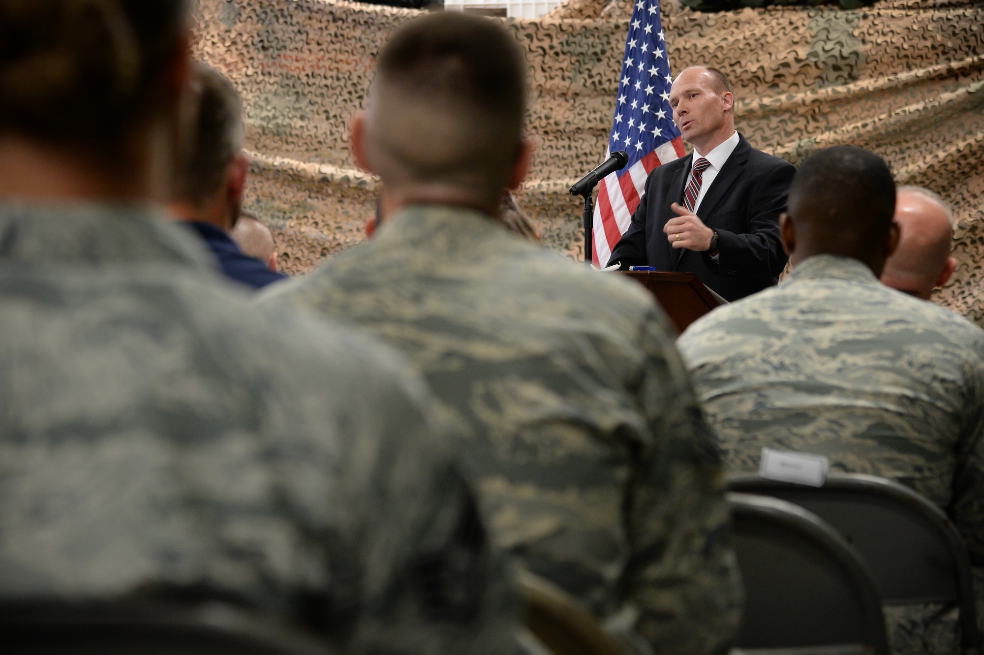 FBI Special Agent Phillip Reid speaks during the Police Week Retreat Ceremony, Hill Air Force Base, Utah, May 13, 2016. The ceremony recognizes the dedicated service of police officers across the United States and pays special tribute to officers who have given their lives in the service of others with a wreath laying and candle lighting. (U.S. Air Force photo by R. Nial Bradshaw)