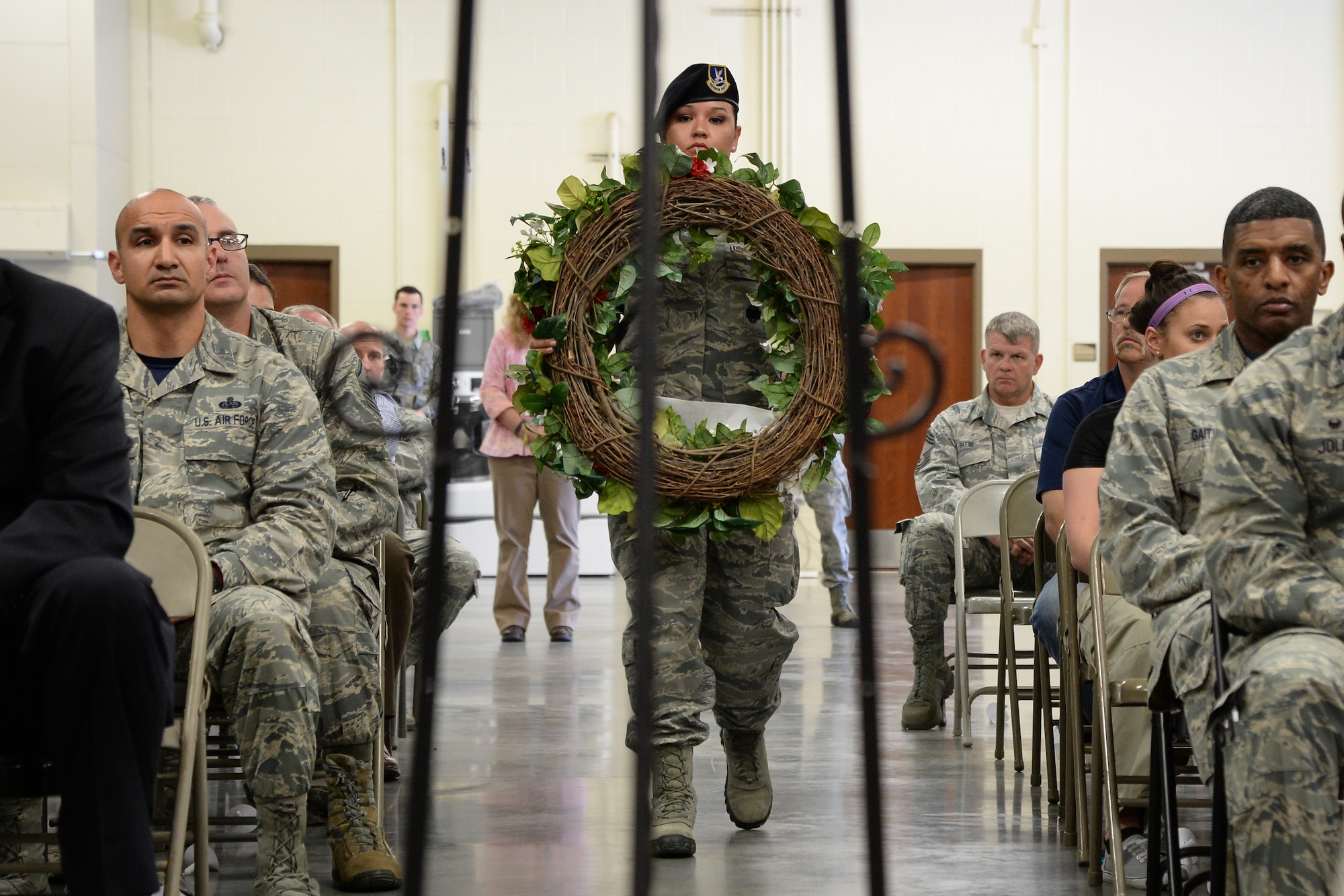 Staff Sgt. Desiree Lovelace prepares to lay a wreath honoring police officers across the United States that have given their lives while serving others during the Police Week Retreat Ceremony, Hill Air Force Base, Utah, May 13, 2016. (U.S. Air Force photo by R. Nial Bradshaw)