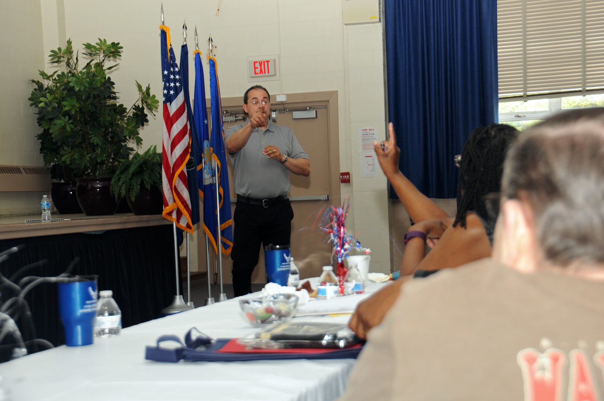 Keith M. Donnell, a certified personal accountant, fields a question from an attendee of the Retirees Appreciation Day hosted by the Retiree’s Activities Office at Horsham Air Guard Station, Pennsylvania, May 14, 2016. The group gathered was able to not only receive pertinent information, but was also given the chance to ask questions in regard to military retirement and benefits. (U.S. Air National Guard photo by Staff Sgt. Michael Shaffer/Released)
