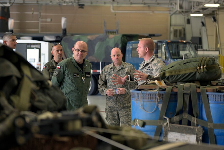 U.S. Air Force Master Sgt. Donald L. Reay, right, an air transportation specialist with the 182nd Logistics Readiness Squadron, Illinois Air National Guard, explains the unit’s airdrop abilities to Polish air force Brig. Gen. Sławomir Żakowski, the deputy commander of the Air Operations Center - Air Component Command, in Peoria, Ill., May 13, 2016. Illinois and the Republic of Poland have been colleagues in the National Guard State Partnership Program since 1993. (U.S. Air National Guard photo by Staff Sgt. Lealan Buehrer)