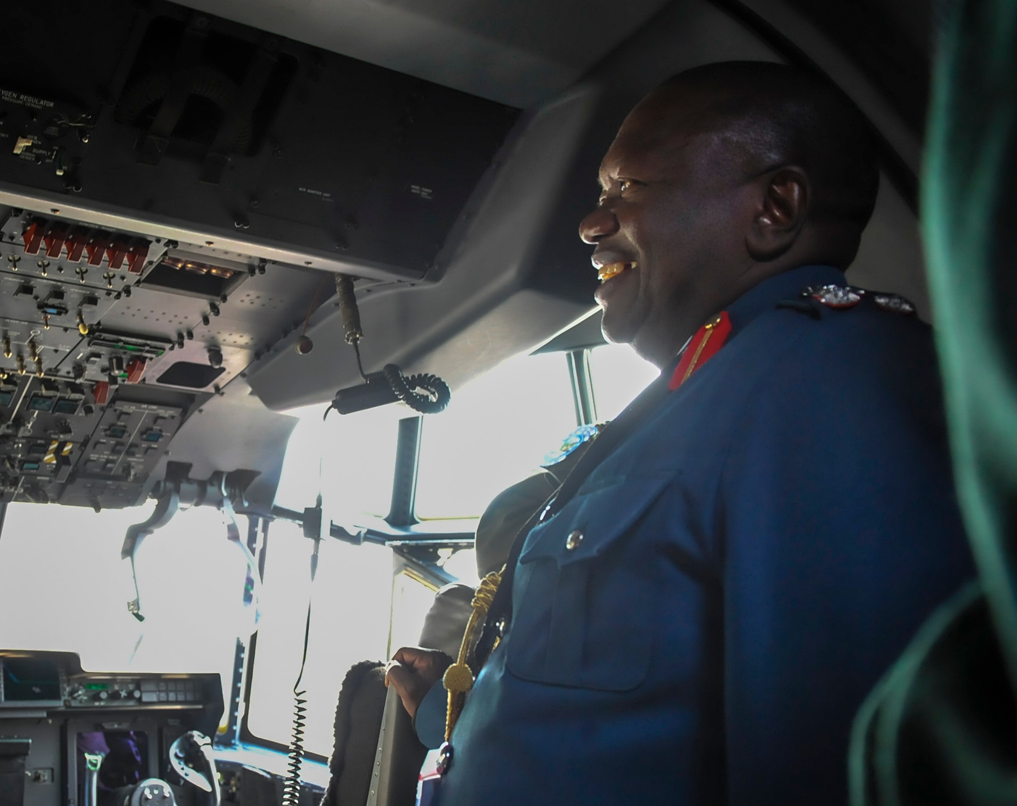 An African Air Chief tours the cockpit of a C-130J Super Hercules during an African Air Chiefs Symposium May 9, 2016, at Ramstein Air Base, Germany. The symposium brought U.S. and African leaders together to talk about partnerships and supporting each other in future situations. (U.S. Air Force photo/Senior Airman Larissa Greatwood)