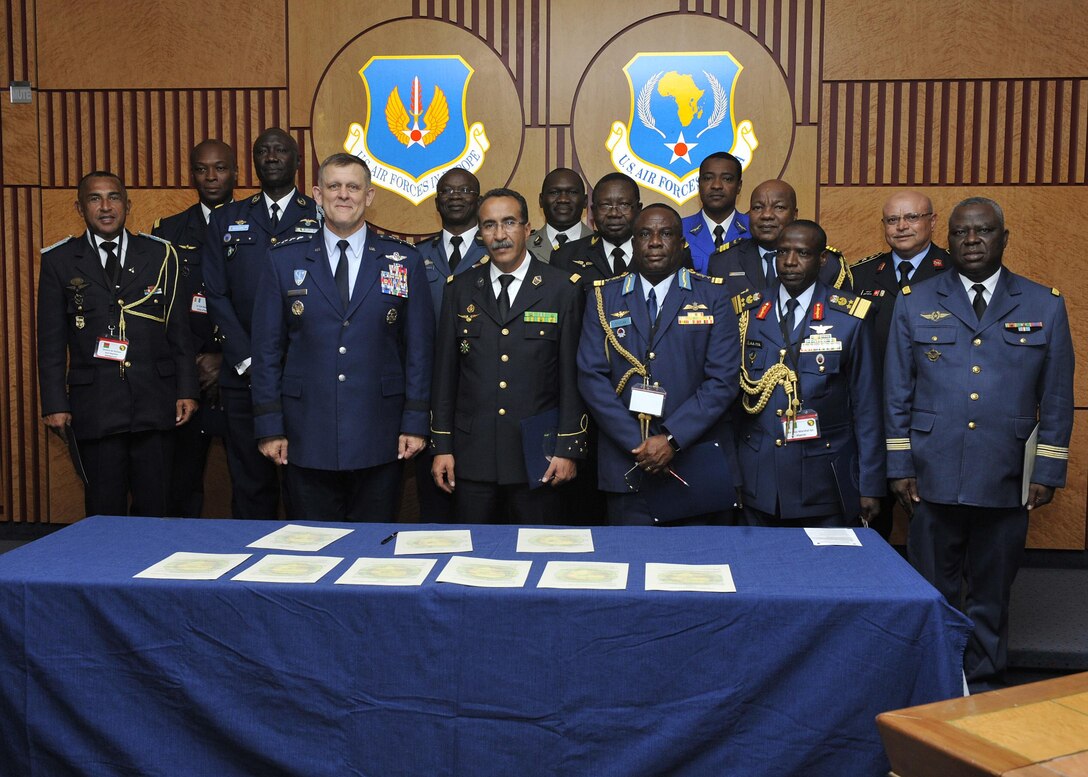 Military leaders pose for a photo after representatives from Benin, Burkina Faso, Chad, Ghana, Madagascar, Mali, Nigeria, Niger, Seychelles, Togo and Tunisia sign the Association of African Air Forces charter May 13, 2016, at Ramstein Air Base, Germany. The charter encourages members to seek opportunities to cooperate and collaborate to improve and support air operations across Africa. (U.S. Air Force photo/Senior Airman Larissa Greatwood)