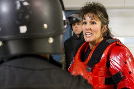 Corrections officer Tori Vandermoere instructs U.S. Army Reserve Soldiers assigned to the 303rd Military Police Company on the proper procedures for cell extraction at the Charles Egeler Reception and Guidance Center in Jackson, Michigan, May 15. The Soldiers were taught inmate control by corrections officer trainers at the local facility. The training is in place to augment their detainee operations in preparation for an upcoming deployment to Guantanamo Bay, Cuba. (U.S. Army photo by Sgt. Audrey Hayes)