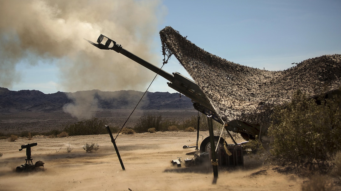 Marines with 3rd Battalion, 11th Marine Regiment, fire a 155mm M777A2 Lightweight Towed Howitzer in the Lead Mountain Training Area at Marine Corps Air Ground Combat Center Twentynine Palms, California, May 3, 2016. This firing exercise was focused on the ability of the M776 Chrome Tubes to resist the formation of hardened downbore residue when firing the M232A1 Propelling Charge 5H (top zone charges).