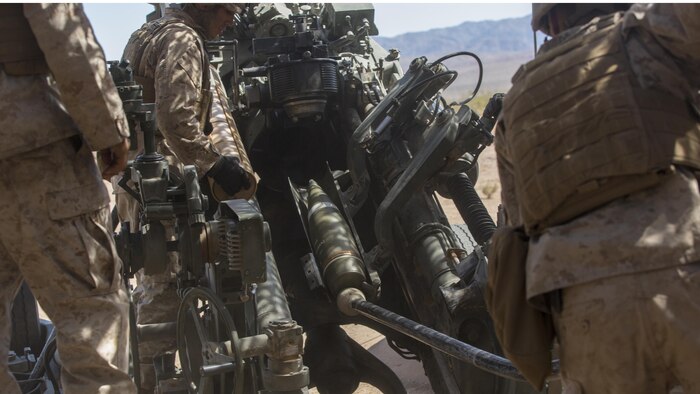 Marines with 3rd Battalion, 11th Marine Regiment, prepare to fire a 155mm M777A2 Lightweight Towed Howitzer in the Lead Mountain Training Area at Marine Corps Air Ground Combat Center Twentynine Palms, California, May 3, 2016. This firing exercise was focused on the ability of the M776 Chrome Tubes to resist the formation of hardened downbore residue when firing the M232A1 Propelling Charge 5H (top zone charges).
