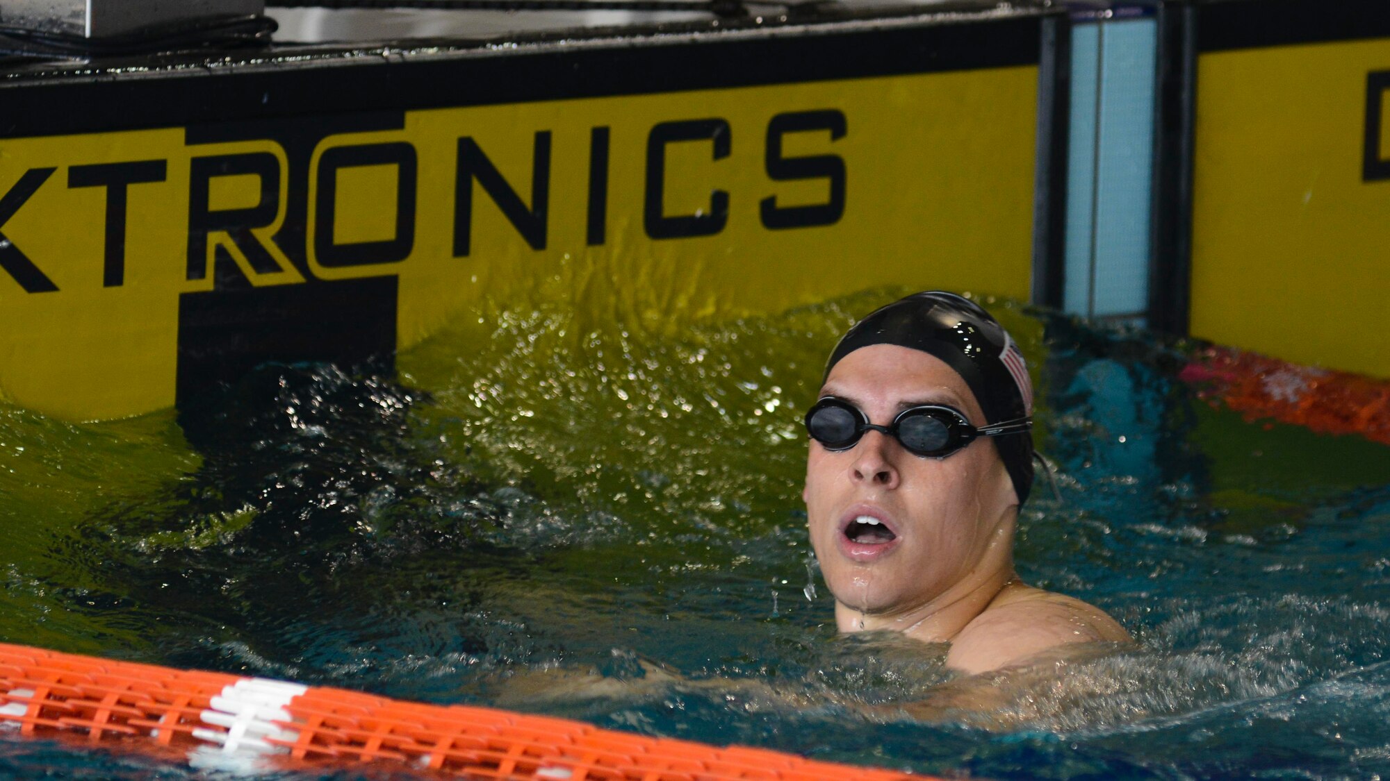 A U.S. Air Forces in Europe Airman checks his time after a 4-man freestyle relay during the 2016 Headquarters Allied Air Command Swimming Championship, May 12, 2016, in Maniago, Italy. The 2016 HQ AIRCOM Swimming Championship brought together six nations from HQ AIRCOM in the spirit of friendly sporting competition. (U.S. Air Force photo by Senior Airman Austin Harvill/Released)