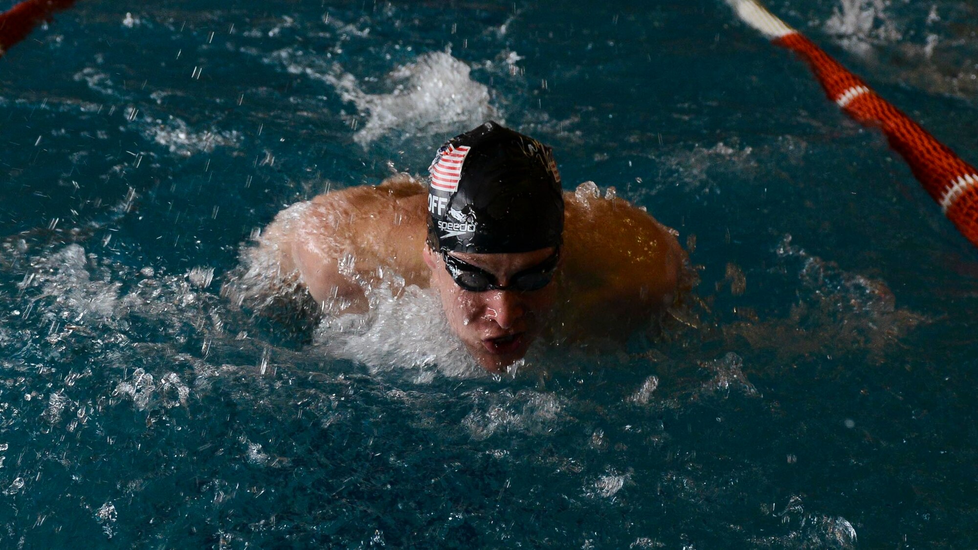 A U.S. Air Forces in Europe Airman practices his butterfly swim technique during a practice swim session, May 10, 2016, in Maniago, Italy. The 2016 Headquarters Allied Air Command Swimming Championship brought together six nations from HQ AIRCOM in the spirit of friendly sporting competition. (U.S. Air Force photo by Senior Airman Austin Harvill/Released)