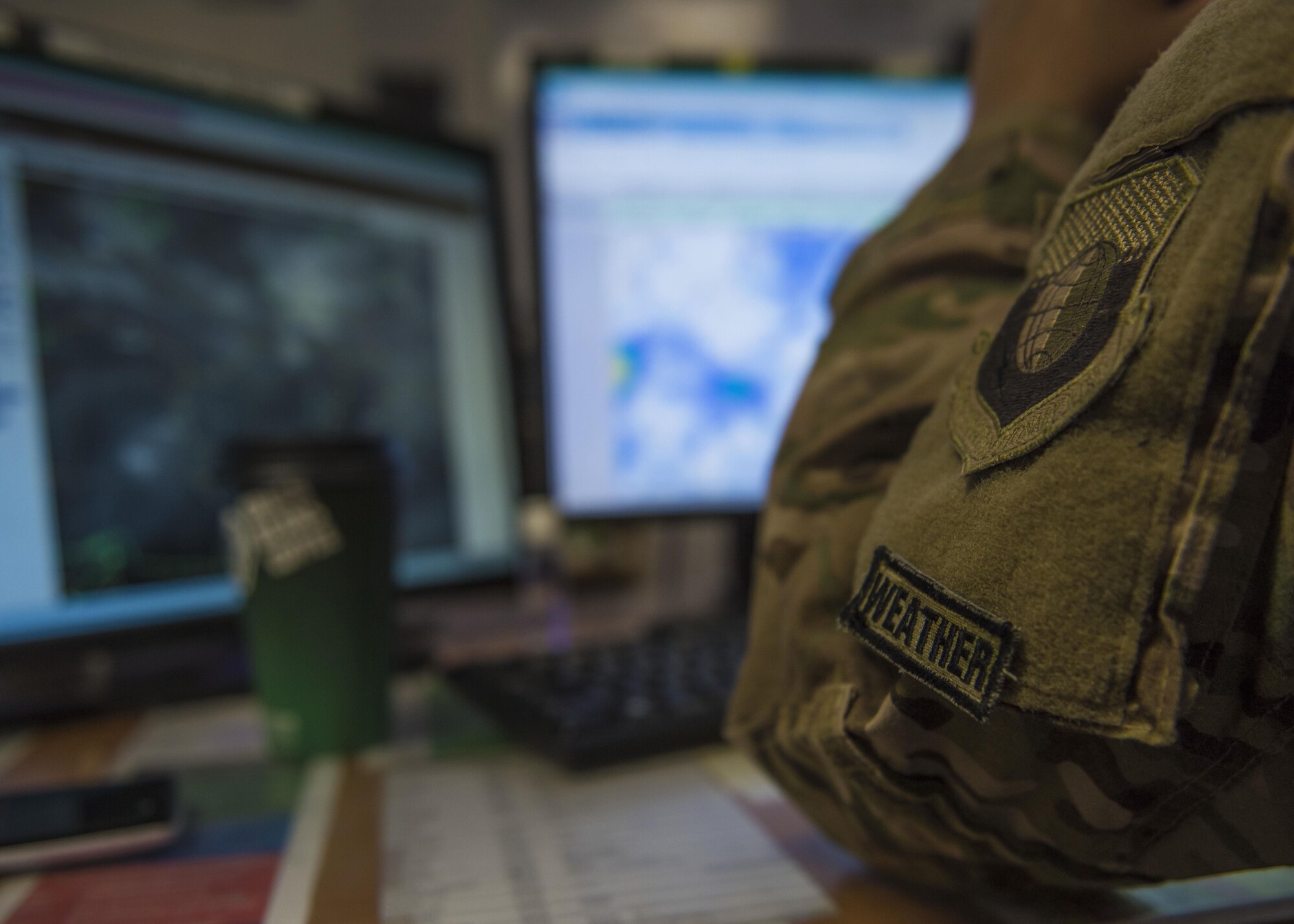 Airman 1st Class Angelena Legate, 455th Expeditionary Operations Support Squadron weather forecaster, looks at a satellite reading at Bagram Airfield, Afghanistan, May 16, 2016. Weather forecasters use fixed and deployable meteorological sensors to measure and evaluate atmospheric and space weather conditions. (U.S. Air Force photo by Senior Airman Justyn M. Freeman)