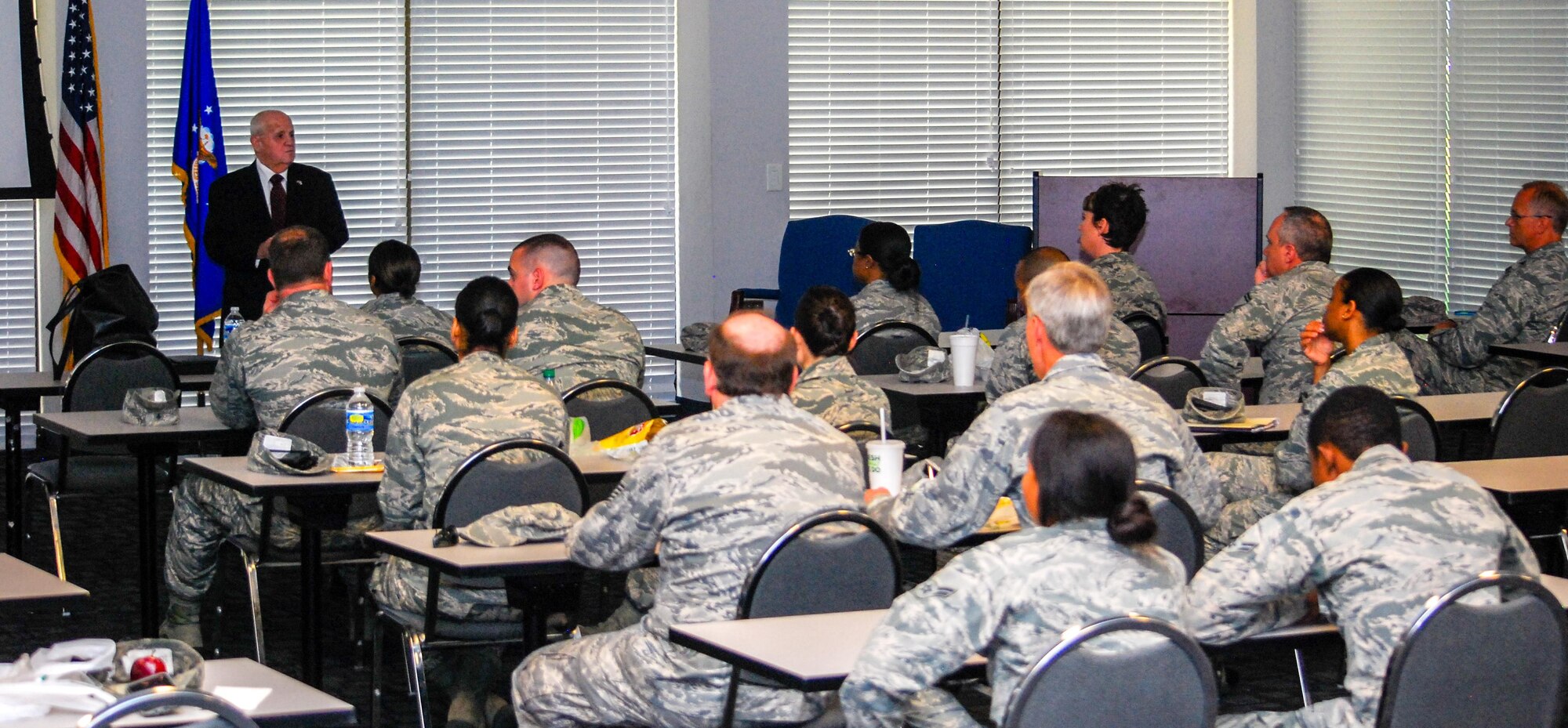 Dobbins Airmen gathered at Verhulst Hall, May 14, 2016, to listen to Hershel Greenblat speak about his Holocaust survival during World War II. (U.S. Air Force photo/Tech. Sgt. Kelly Goonan)