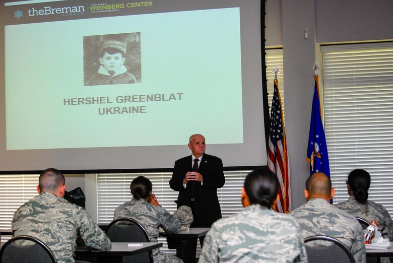Dobbins Airmen gathered at Verhulst Hall, May 14, 2016, to listen to Hershel Greenblat speak about his Holocaust survival during World War II. (U.S. Air Force photo/Tech. Sgt. Kelly Goonan)