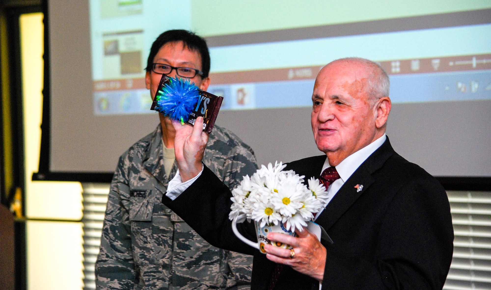 Dobbins Airmen gathered at Verhulst Hall, May 14, 2016, to listen to Hershel Greenblat speak about his Holocaust survival during World War II. (U.S. Air Force photo/Tech. Sgt. Kelly Goonan)