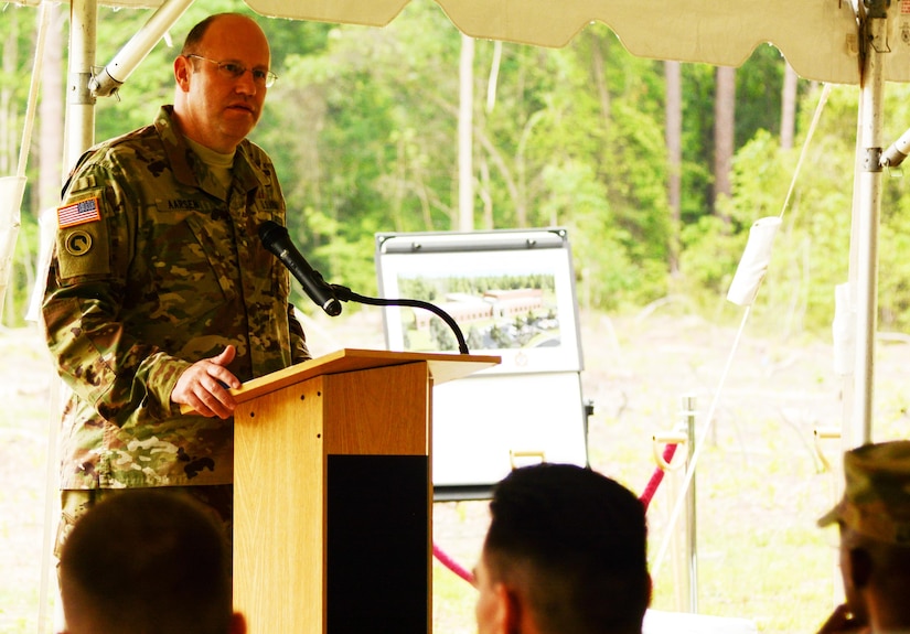 Col. John W Aarsen, assistant commander 94th Training Division, addresses the audience during the 94th TD’s groundbreaking ceremony for a new training facility May 12, 2016. The 39,127-square-foot training center will be equipped with 15 classrooms and will include a maintenance training area for transportation courses, as well as a state of the art instructional kitchen for food service specialist courses. Ninety-fourth TD instructors could potentially train 2,635 Soldiers while teaching 120 classes annually. “This division has had a long commitment to the American public and this new building helps demonstrate this support that the American people have for our mission,” Aarsen said.