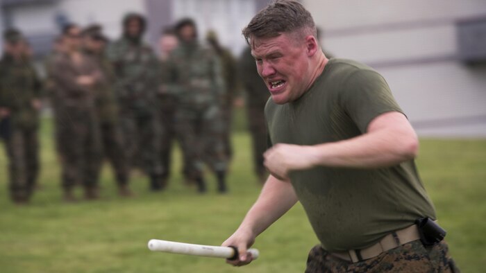 Cpl. Joseph A. Myers, a military policeman with 4th Law Enforcement Battalion, Force Headquarters Group, Marine Forces Reserve, participates in the oleoresin capsicum qualification course during exercise Platinum Wolf 16 at Peacekeeping Operations Training Center South Base, Serbia, May 11, 2016. Exercise Platinum Wolf 16 is designed to seamlessly integrate Reserve Marines with the active component while demonstrating interoperability with partner nations in the region. 