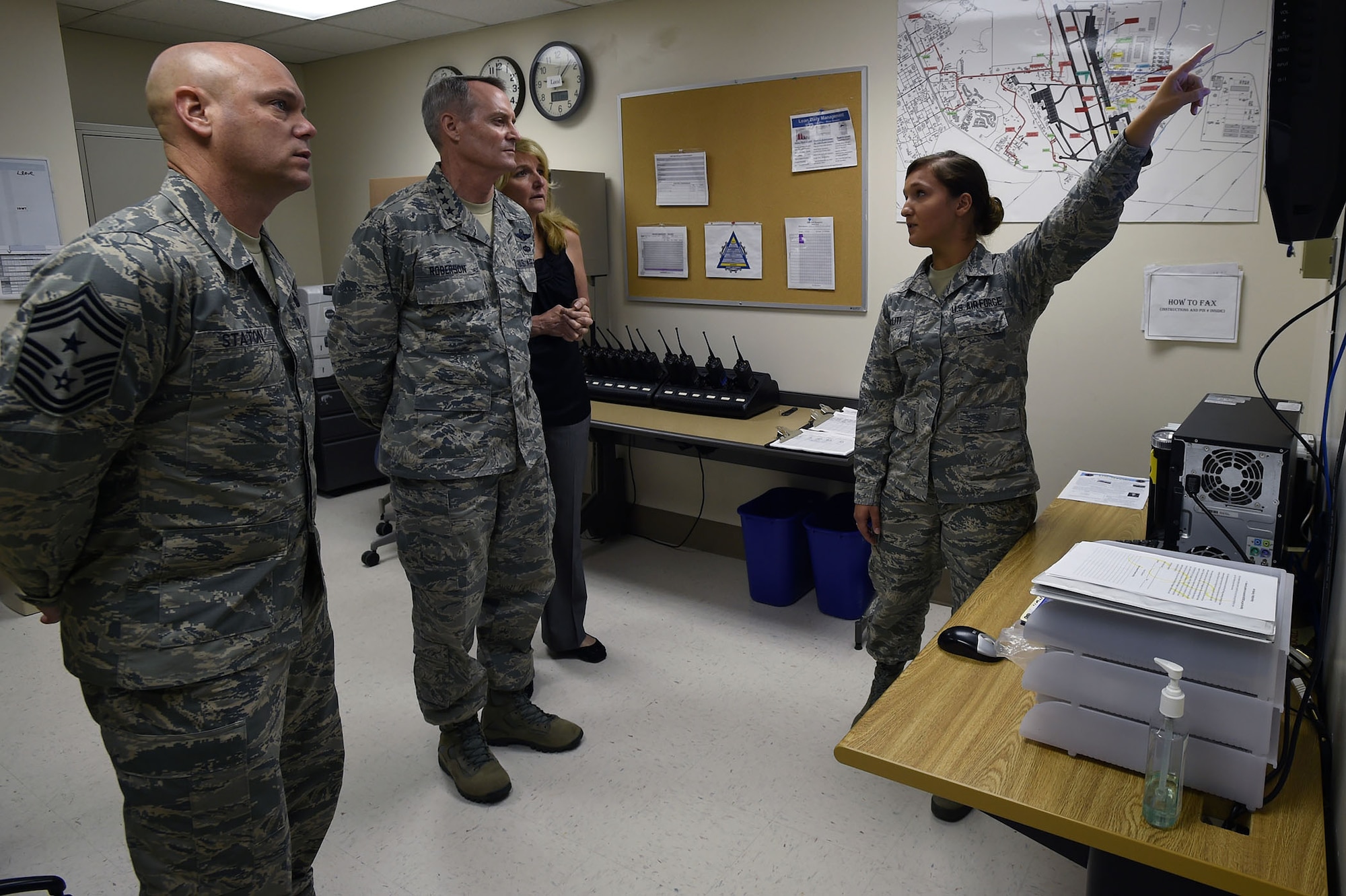 Senior Airman Arlinda Haliti briefs Lt. Gen. Darryl Roberson, commander, Air Education and Training Command, his wife, Cheryl Roberson, and AETC Command Chief Master Sgt. David Staton, on the En-Route Patient Staging System facility and mission May 11 at the Wilford Hall Ambulatory Surgical Center, Joint Base San Antonio-Lackland.  Roberson and Staton visited the WHASC May11, meeting with 59th Medical Wing senior leaders and Airmen to learn more about the wing’s mission of developing warrior medics through patient-centered health care and continuous improvement. Haliti is an aerospace medical technician with the 559th Aerospace Medicine Squadron. (U.S. Air Force photo/Staff Sgt. Jason Huddleston)