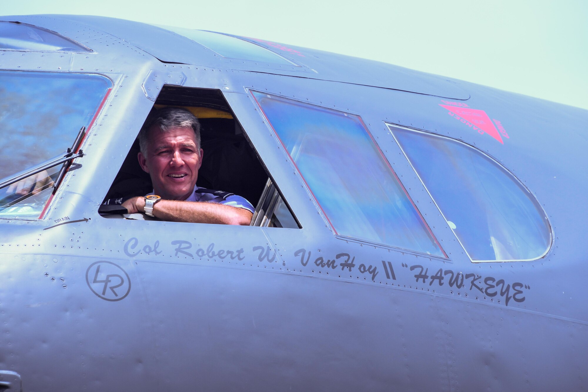 U.S. Air Force Col. Robert VanHoy, the 93rd Bomb Squadron commander, looks out from the pilot’s seat of a B-52 Stratofortress for photos on Barksdale Air Force Base, La. VanHoy’s new rank was unveiled on his designated B-52 Stratofortress after his promotion ceremony on May 15, 2016. (U.S. Air Force photo by Master Sgt. Dachelle Melville/Released)
