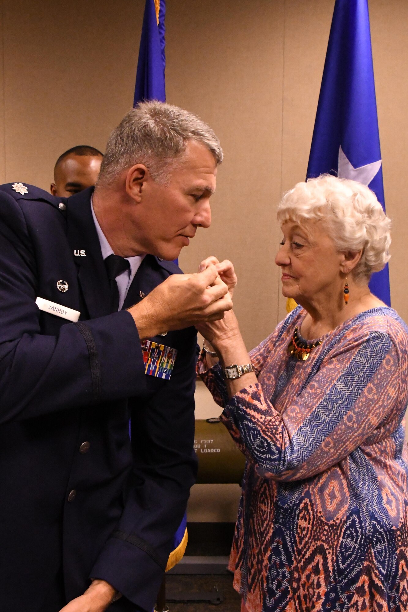 Helen VanHoy pins the rank of colonel onto her son Robert VanHoy, the commander of the 93rd Bomb Squadron (BS), during a promotion ceremony at Barksdale Air Force Base, La. on May 15, 2016. In addition to being the BS commander, VanHoy is also a command pilot with over 4,000 flight hours. (U.S. Air Force photo by Master Sgt. Dachelle Melville/Released)