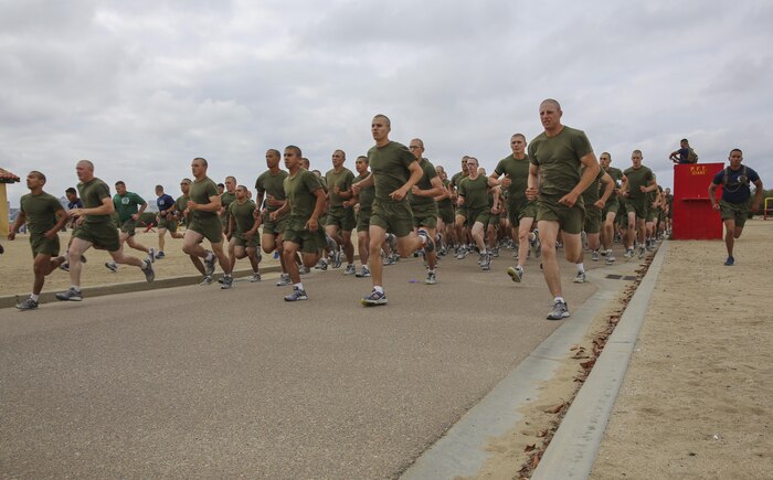 Recruits of Lima Company, 3rd Recruit Training Battalion, begin a three-mile run during an inventory physical fitness test at Marine Corps Recruit Depot San Diego, May 16. The run was the second portion of the event, after the pull-ups and before conducting crunches. Annually, more than 17,000 males recruited from the Western Recruiting Region are trained at MCRD San Diego. Lima Company is scheduled to graduate June 10.