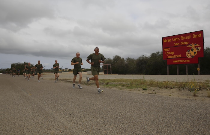 Recruits of Lima Company, 3rd Recruit Training Battalion, conduct a three-mile run during an inventory physical fitness test at Marine Corps Recruit Depot San Diego, May 16. There are three parts to the test: pull-ups, a three-mile run and crunches. Annually, more than 17,000 males recruited from the Western Recruiting Region are trained at MCRD San Diego. Lima Company is scheduled to graduate June 10.
