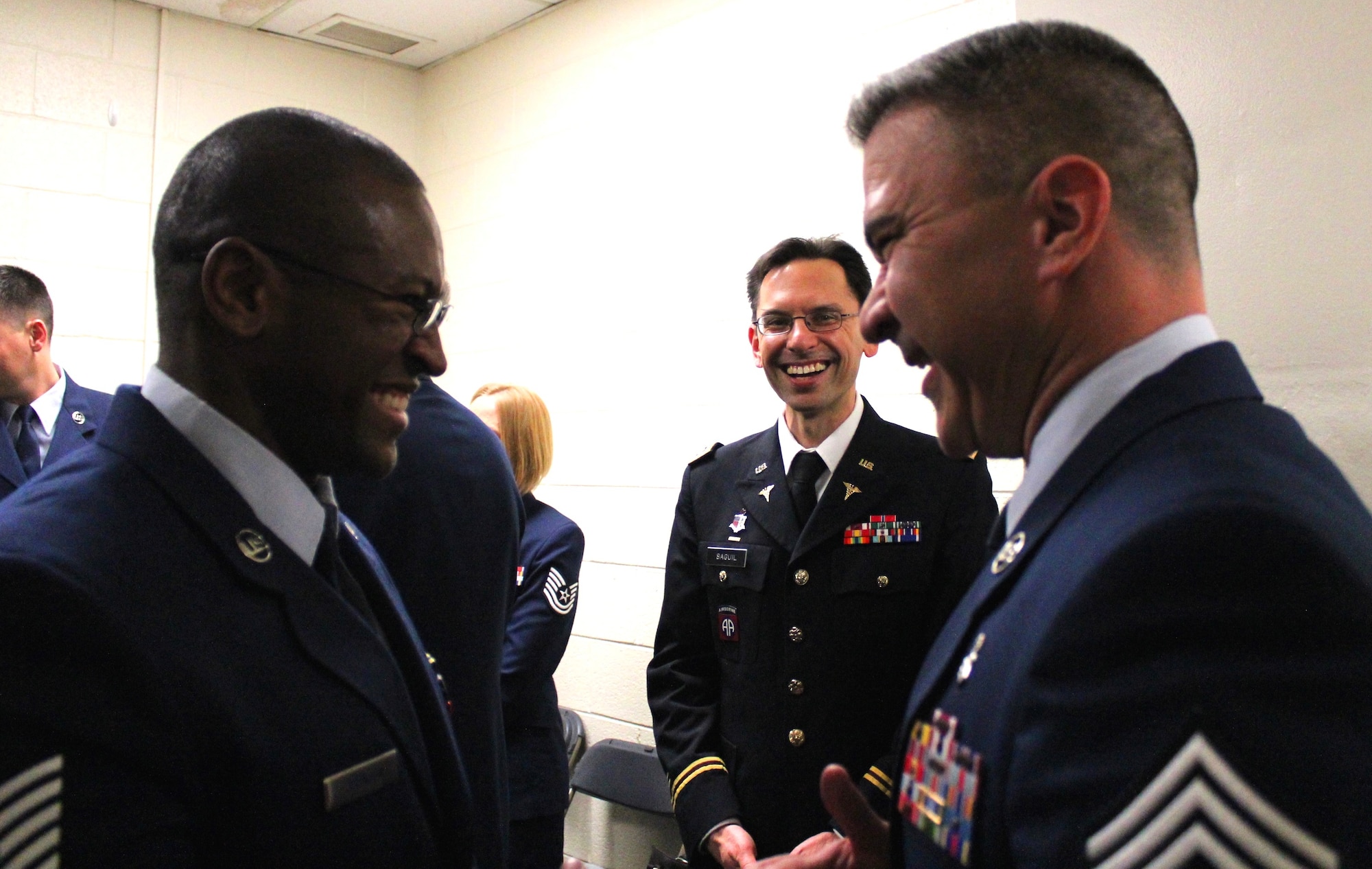 Chief Master Sgt. E. Jason Pace (right) and Tech. Sgt. Kenneth Johnson (left) meet backstage before the commencement ceremony held at George Mason University on May 11, 2016. EMDP2 graduation was a particularly memorable event for Chief Master Sgt. Pace, who got to witness his mentee, Tech. Sgt. Johnson cross the next milestone on his way to medical school. (U.S. Air Force photo by Prerana Korpe, AFMS Public Affairs)