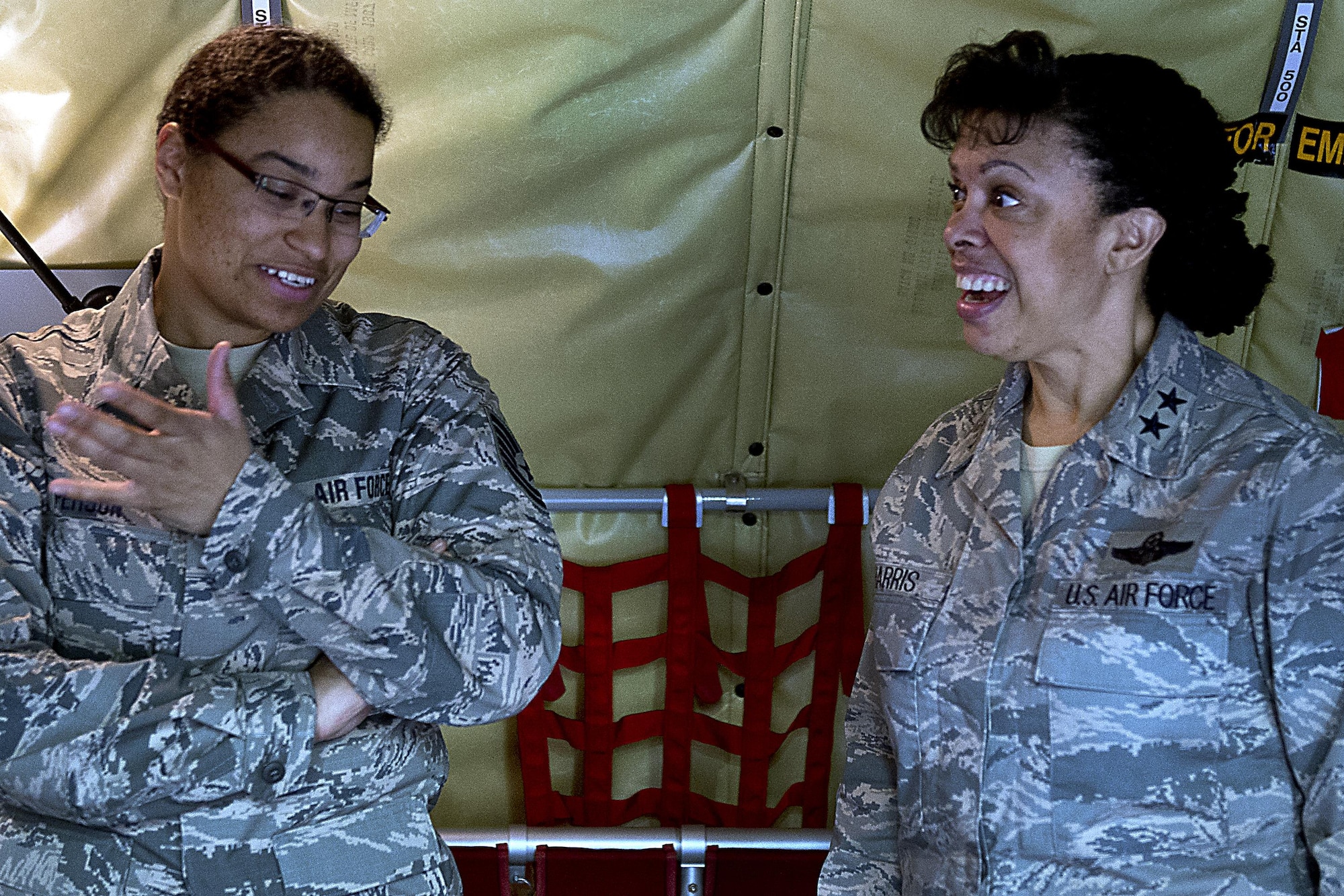 Tech. Sgt. Julia Person, 434th Aircraft Maintenance Squadron, tells Maj. Gen. Stayce Harris, 22nd Air Force commander, about her experience working with the KC-135R Stratotanker April 12, 2016 at Grissom Air Reserve Base, Ind. Harris interacted with several Airmen during her visit, taking time to talk to and get to know each of them personally. (U.S. Air Force photo/Senior Airman Dakota Bergl)