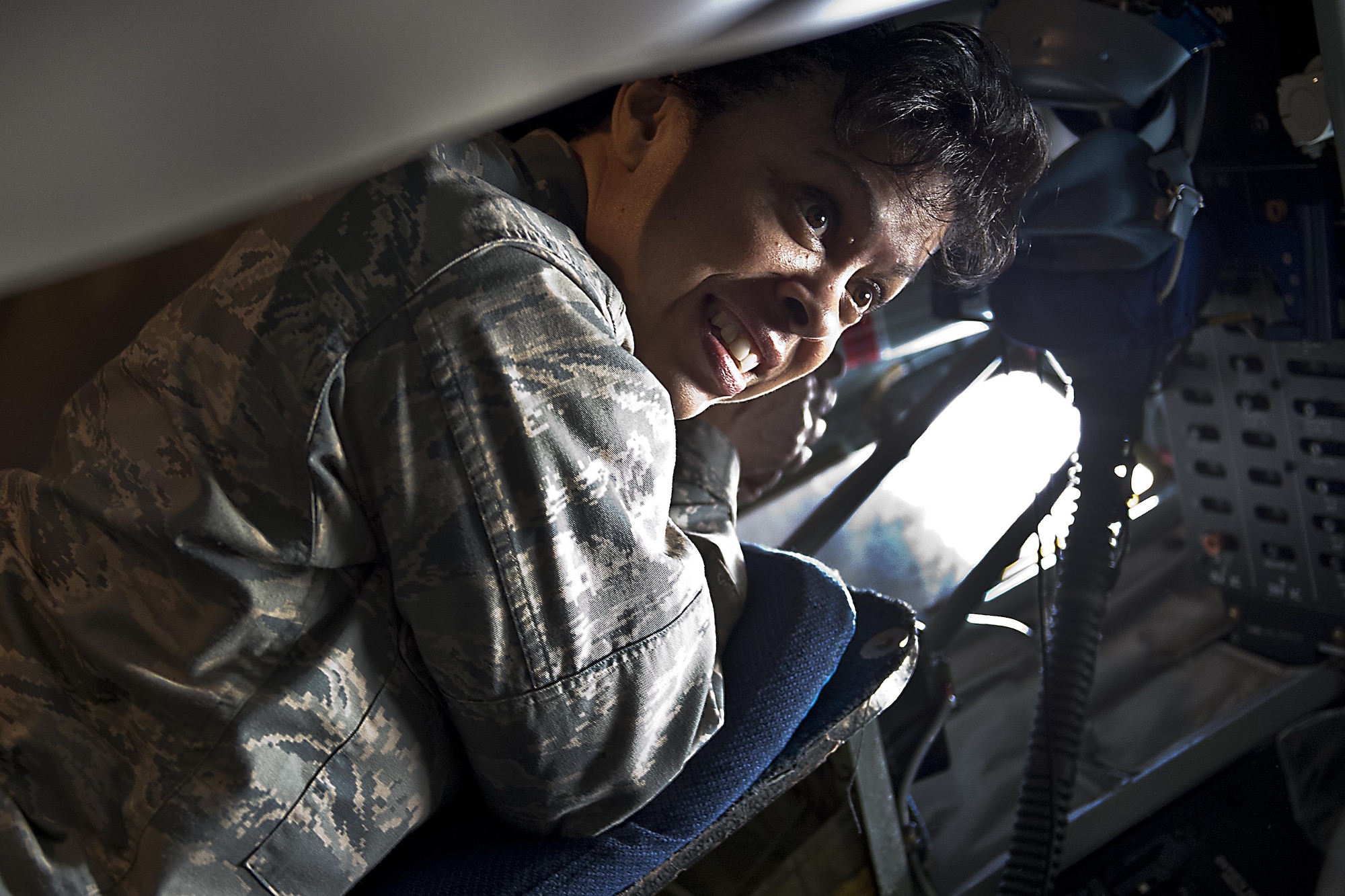 Maj. Gen, Stayce Harris, 22nd Air Force commander, takes a look at the boom pod in one of Grissom’s KC-135R Stratotankers on April 12, 2016 at Grissom Air Reserve Base, Ind. The Stratotanker was the final stop on Harris’s visit to Grissom. (U.S. Air Force photo/Senior Airman Dakota Bergl)