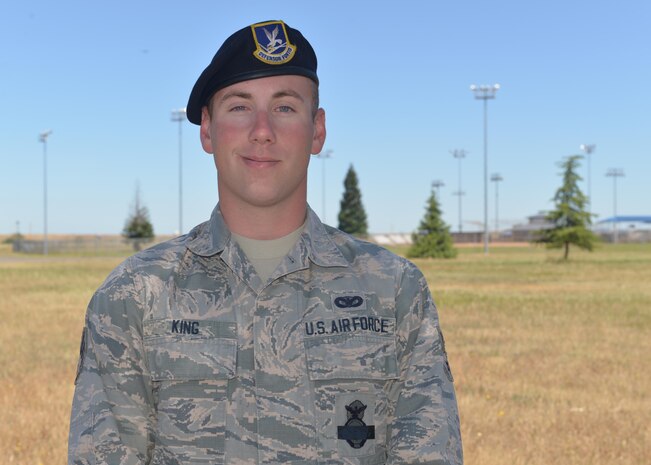 Senior Airman Christopher King, 9th Security Forces Squadron installation entry controller, poses for photo outside the 9SFS building at Beale Air Force Base, California. (U.S. Air Force photo by Senior Airman Benjamin Bugenig)