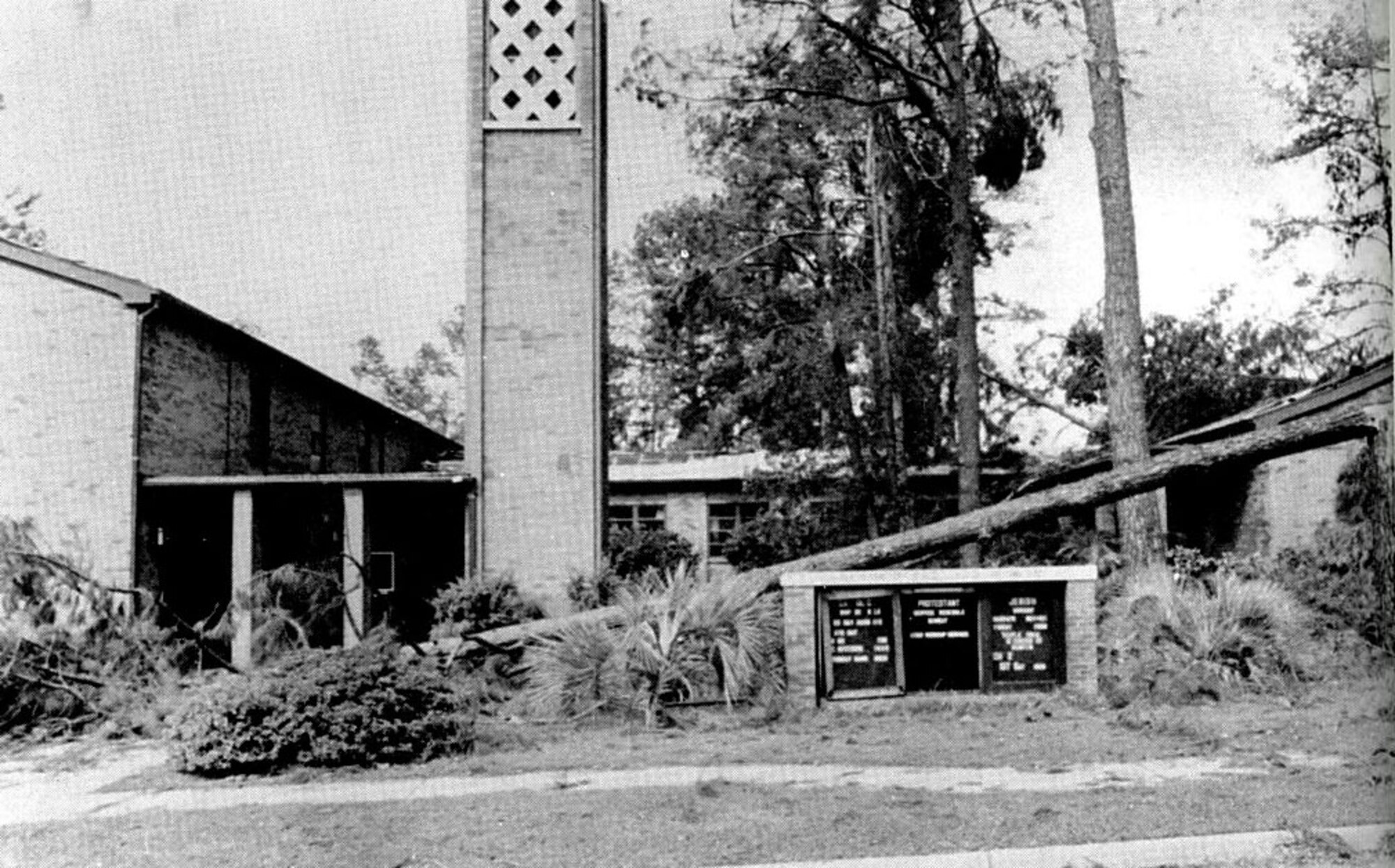 Fallen trees and debris at the Palmetto Chapel, then Chapel One, after Hurricane Hugo hit Shaw Air Force Base, S.C., September 1989. Hurricane Hugo inflicted approximately $45 million worth of damages to Shaw, with recorded winds up to 109 mph. (Courtesy photo by Shaw Air Force Base historian)