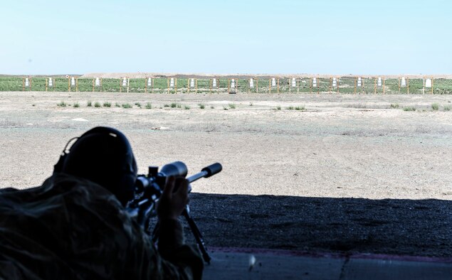 Justin Scott, Canyon County sheriff office detective, fires at a target during a sniper training exercise April 20, 2016, at Mountain Home Air Force Base, Idaho. Mountain Home AFB's range gave the officers an opportunity to shoot at long distances.  (U.S. Air Force photo by Airman 1st Class Chester Mientkiewicz/Released)
