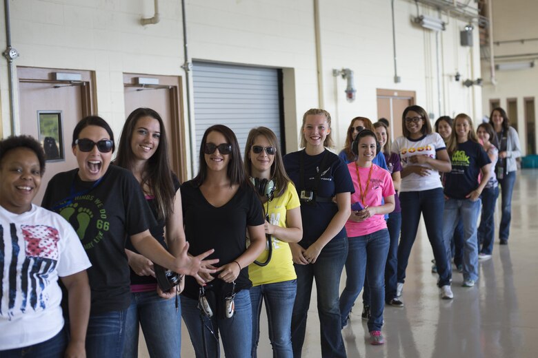 Spouses of U.S. Air Force Airmen from the 347th Rescue Group wait to fly during a spouses’ flight event, May 13, 2016, at Moody Air Force Base, Ga. The event gave spouses the opportunity to experience what some Airmen do every day. (U.S. Air Force photo by Airman Daniel Snider/Released)
