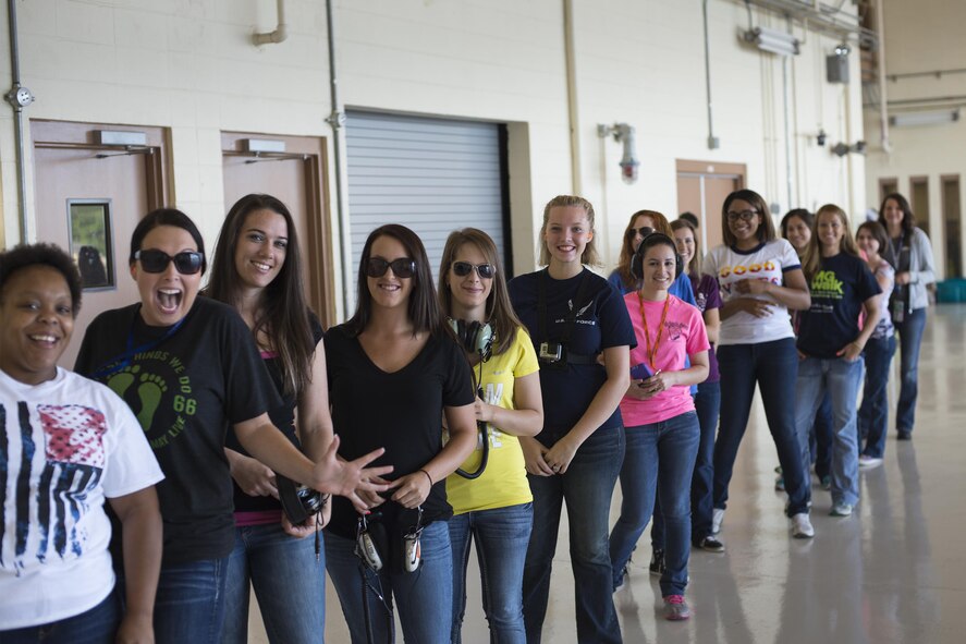 Spouses of U.S. Air Force Airmen from the 347th Rescue Group wait to fly during a spouses’ flight event, May 13, 2016, at Moody Air Force Base, Ga. The event gave spouses the opportunity to experience what some Airmen do every day. (U.S. Air Force photo by Airman Daniel Snider/Released)

