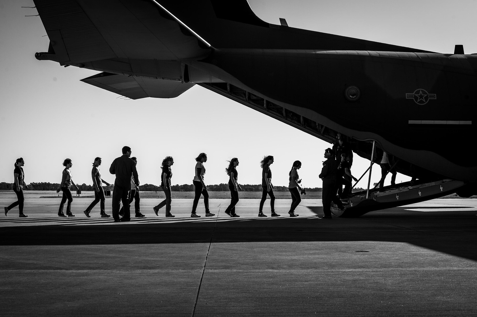 Spouses of U.S. Air Force Airmen from the 347th Rescue Group board an HC-130J Combat King II during a spouses’ flight event, May 13, 2016, at Moody Air Force Base, Ga. Spouses were briefed about mission plans and safety before they were allowed onto the aircraft. (U.S. Air Force photo by Airman Daniel Snider/Released)