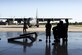 U.S. Air Force Master Sgt. Jerome Ware, 71st Rescue Squadron operations superintendent, tells his children about an HC-130J Combat King II during a spouses’ flight event, May 13, 2016, at Moody Air Force Base, Ga. Members from the 347th Rescue Group deploy worldwide to perform search and rescue missions and air refueling missions. (U.S. Air Force photo by Airman Daniel Snider/Released)