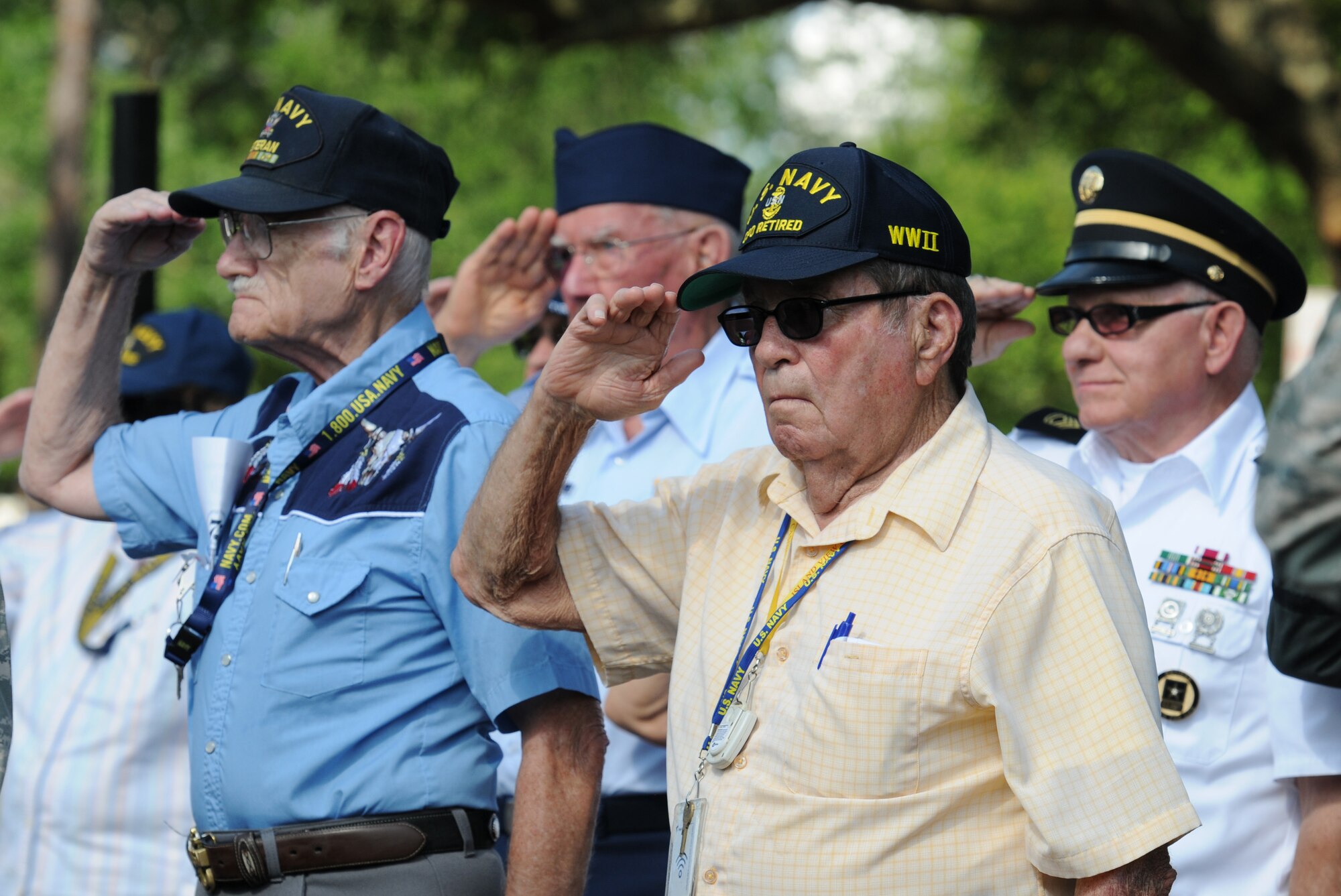 U.S. Navy retired Chief Petty Officer Frederick Petersen and fellow members from the Armed Forces Retirement Home render a salute during the playing of taps at the Lt. Samuel Reeves Keesler, Jr. Memorial Retreat Ceremony May 13, 2016, Keesler Air Force Base, Miss. The event was held in honor of Lt. Keesler’s date of entry into the Army Air Service 99 years ago. The retreat ceremony is part of a year-long celebration of Lt. Keesler, a Mississippi native and WORLD WAR I hero, and the 75th anniversary of the opening of the base. (U.S. Air Force photo by Kemberly Groue)