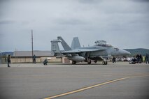 U.S. Navy Sailors from VAQ-137, Naval Air Station Whidbey Island, Washington, work preparing an EA-18G Growler aircraft for a sortie May 9, 2016 during RED-FLAG-Alaska 16-1 at Eielson Air Force Base, Alaska. More than 40 Sailors from VAQ-137 are augmenting RF-A, a Pacific Air Forces command directed field training exercise for U.S. and allied forces, to provide joint offensive counter-air, interdiction, close air support and large force employment training in a simulated combat environment. (U.S. Air Force photo by Staff Sgt. Shawn Nickel/Released)
