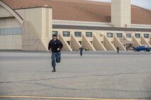 U.S. Navy Sailors from VAQ-137, Naval Air Station Whidbey Island, Washington, sprint to an EA-18G Growler aircraft to trouble shoot a mechanical issue May 9, 2016, during RED-FLAG-Alaska (RF-A) 16-1 at Eielson Air Force Base, Alaska. The primary mission of the flying unit is the suppression of enemy air defenses in support of strike aircraft and ground troops by interrupting enemy electronic activity and obtaining tactical electronic intelligence. (U.S. Air Force photo by Staff Sgt. Shawn Nickel/Released)
