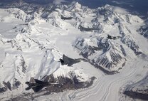 U.S. Air Force, Navy and Indian Air Force fighter aircraft fly in formation during a training sortie in the Joint Pacific Alaska Range Complex during RED FLAG-Alaska (RF-A) 16-1 May 12, 2016, hosted at Eielson Air Force Base, Alaska. More than 75 aircraft and 1,400 participants were involved in RF-A 16-1; a Pacific Air Forces commander directed field training exercise for U.S. and allied forces, to provide joint offensive counter-air, interdiction, close air support and large force employment training in a simulated combat environment. (Courtesy photo by Jim Haseltine/Released)