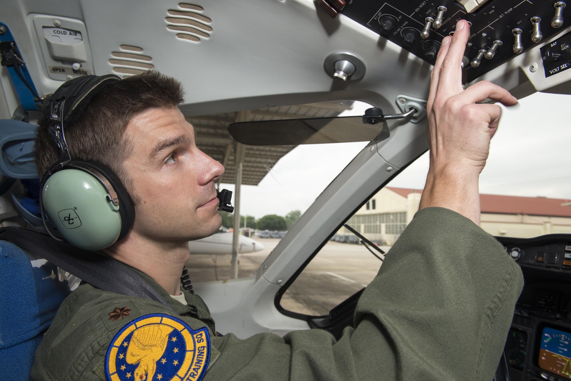Maj. Ryan Scott, 99th Flying Training Squadron “A” flight commander and T-1A Jayhawk instructor pilot, checks the instrument panel of  a T-1A before a training mission at Joint Base San Antonio-Randolph May 16, 2016. The 99th FTS is the Department of Defense’s sole provider for T-1A pilot instructor training. 