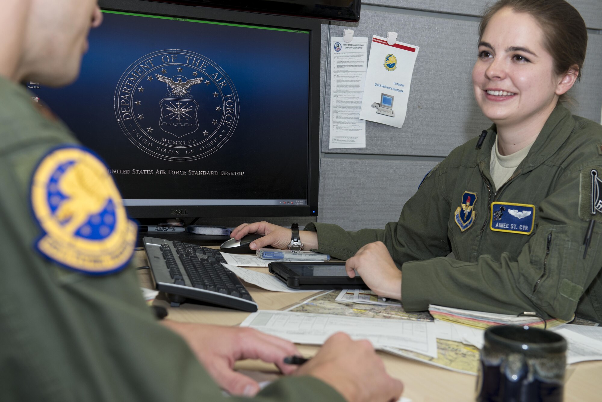 Second Lt. Aimee St. Cyr, 99th Flying Training Squadron instructor pilot trainee, gives a mission brief to her instructor pilot at Joint Base San Antonio-Randolph May 12, 2016. St. Cyr is a first assignment instructor pilot trainee and came to JBSA-Randolph after undergraduate pilot training. 