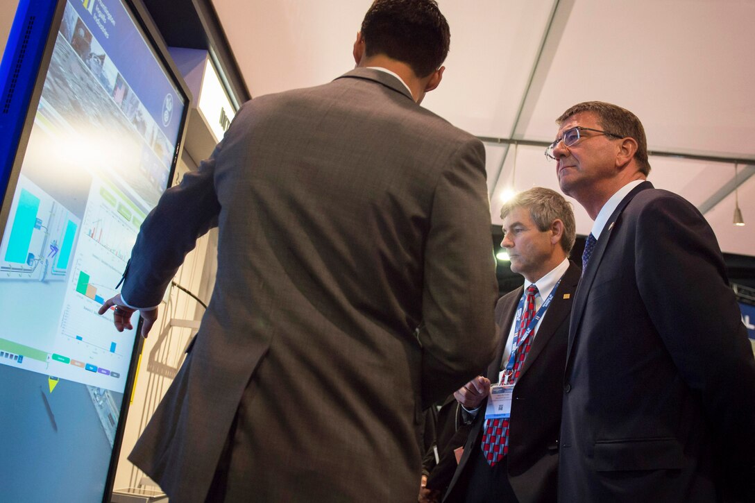 Defense Secretary Ash Carter speaks with an exhibitor at the Navy League's Sea-Air-Space Exposition at National Harbor, Md., May 17, 2016. Carter delivered remarked at the event. DoD photo by Air Force Senior Master Sgt. Adrian Cadiz