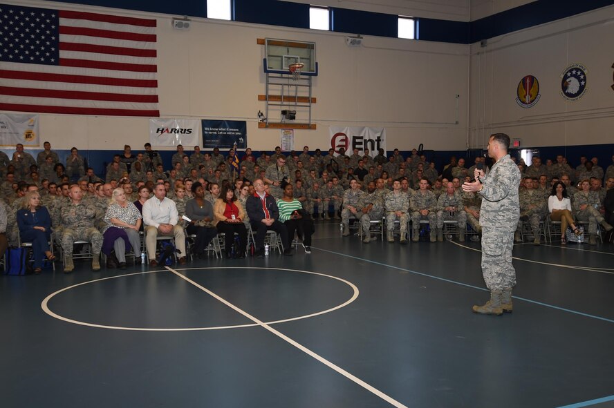 Col. Anthony Mastalir, 50th Space Wing vice commander, addresses Schriever personnel during the Wingman University commander’s all call and pep rally at Schriever Air Force Base, Colorado, Thursday, May 12, 2016. Mastalir spoke about being a wingman, dealing with challenges and stressors, and the Green Dot program. (U.S. Air Force photo/2nd Lt. Darren Domingo)