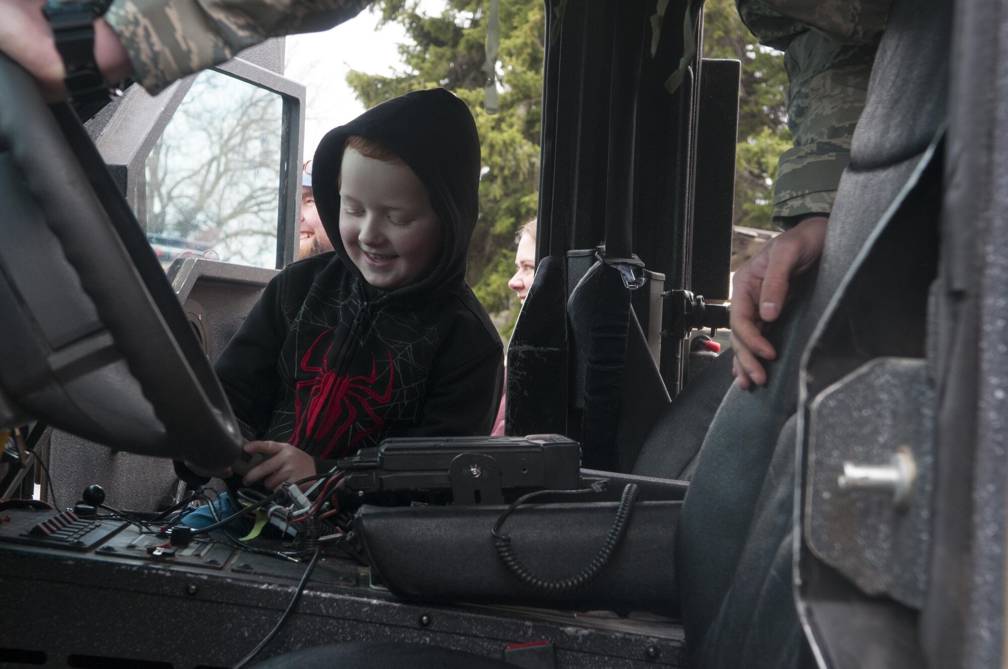 Liam White, 5, looks through the inside of a 90th Security Forces Group BearCat armored vehicle May 17, 2016, during the city’s annual Armed Forces Day celebration at the Cheyenne, Wyo., Veterans Administration Medical Center May 14, 2016. Liam was also given the chance to test out the loud speaker and sirens used inside the vehicle. (U.S. Air Force photo by Airman 1st Class Malcolm Mayfield)