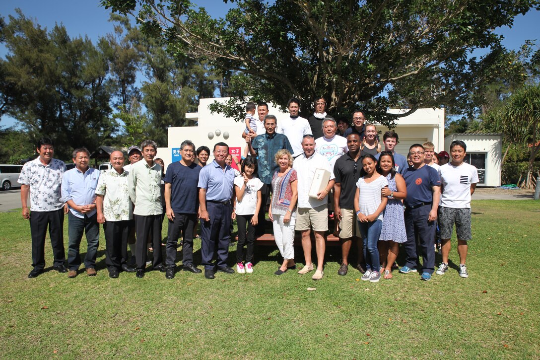 Kin town mayor Hajime Nakama, district chiefs, and town officials hosted Camp Hansen commander Col. Sean M. McBride and his family, and Sgt. Maj. Devon A. Lee and his family for afternoon barbecue at Nature Mirai-kan May 14, 2016.